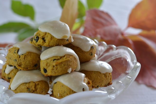 Little Iced Pumpkin Spice Cookies on a pedestal tray.
